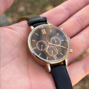 QRTZ Black Leather Strap Watch with Gold Accents